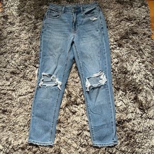 Ripped Mom jeans, medium wash.